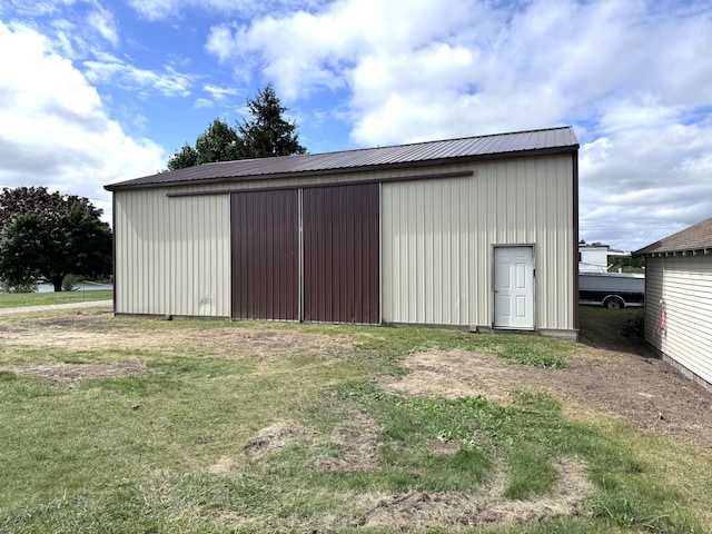 1537 Tecumseh Rd, Cheboygan, MI 49721 - view of pole building featuring a lawn