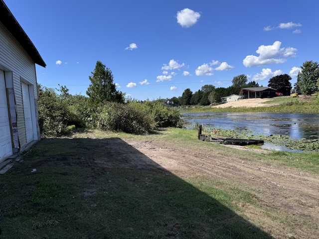1537 Tecumseh Rd, Cheboygan, MI 49721 - view of yard with a water view