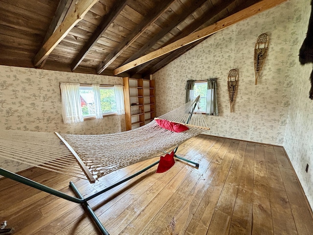 4650 Mckinley Rd, Mio, MI 48647 - unfurnished bedroom with wallpapered walls, wood-type flooring, and wooden ceiling