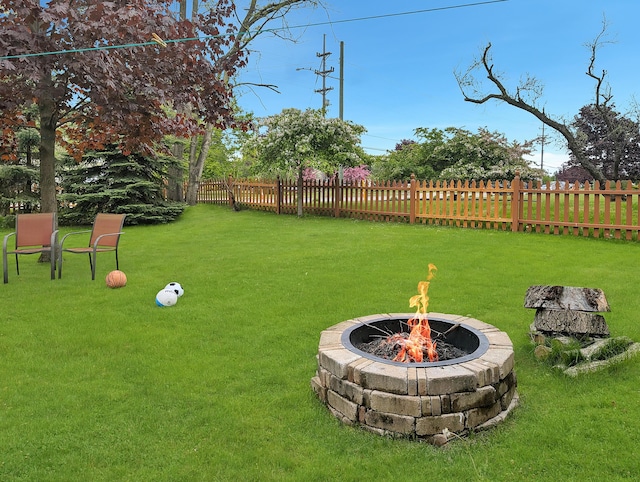 101 Island View Dr, Alpena, MI 49707 - view of yard with a fire pit