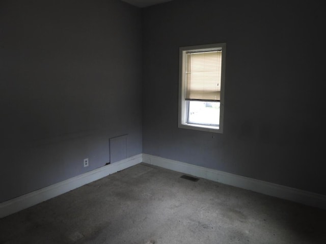 120 Copier St, Cadillac, MI 49601 - unfurnished room featuring baseboards and carpet flooring