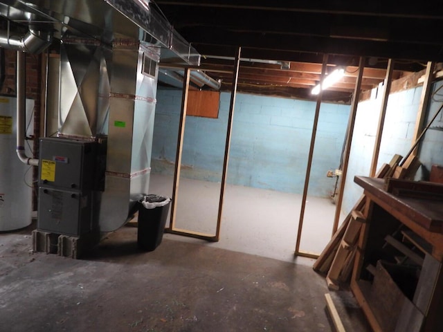 120 Copier St, Cadillac, MI 49601 - unfinished below grade area with water heater and heating unit