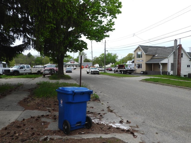 120 Copier St, Cadillac, MI 49601 - view of asphalt street with sidewalks