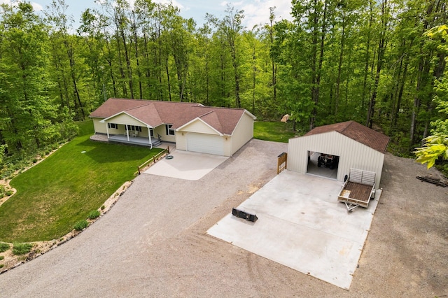 2510 Primrose Rd, Elmira, MI 49730 - aerial view of property and surrounding area with a heavily wooded area