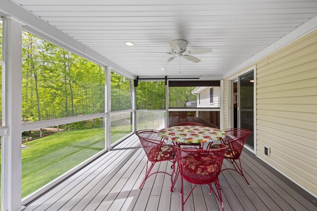 2510 Primrose Rd, Elmira, MI 49730 - sunroom with ceiling fan and outdoor dining area