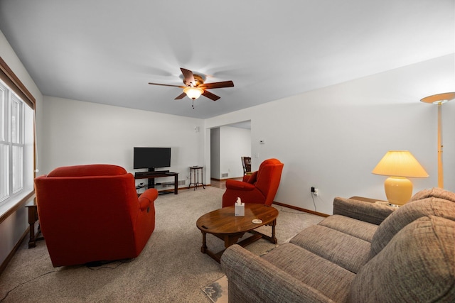 2510 Primrose Rd, Elmira, MI 49730 - living area with ceiling fan, carpet flooring, and baseboards