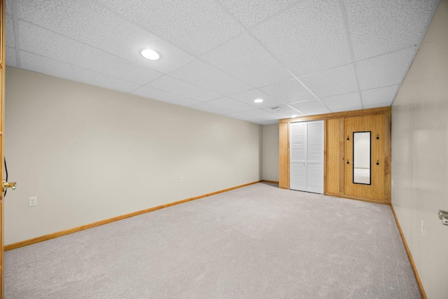 2510 Primrose Rd, Elmira, MI 49730 - spare room featuring light carpet, baseboards, recessed lighting, and a drop ceiling
