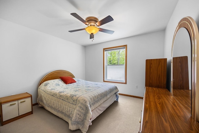2510 Primrose Rd, Elmira, MI 49730 - bedroom featuring carpet, baseboards, and a ceiling fan