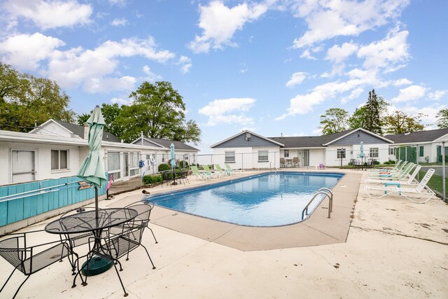 5616 W Houghton Lk, Houghton Lake, MI 48629 - community pool with a patio area