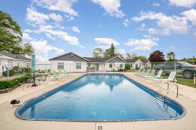 5616 W Houghton Lk, Houghton Lake, MI 48629 - community pool with a patio area