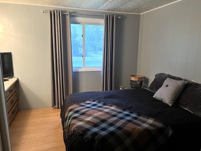 2056 Hobbs Dr, Alpena, MI 49707 - bedroom with light wood-type flooring