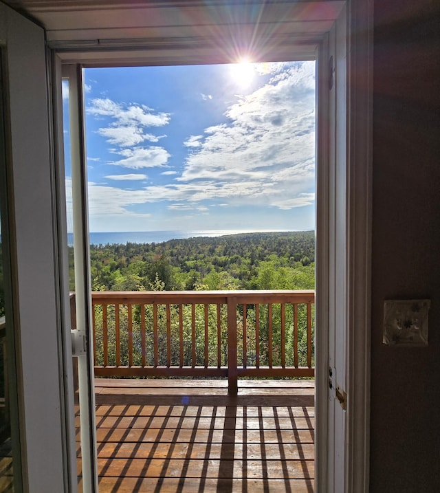 N1746 Smith Rd, Saint Ignace, MI 49781 - deck with a forest view