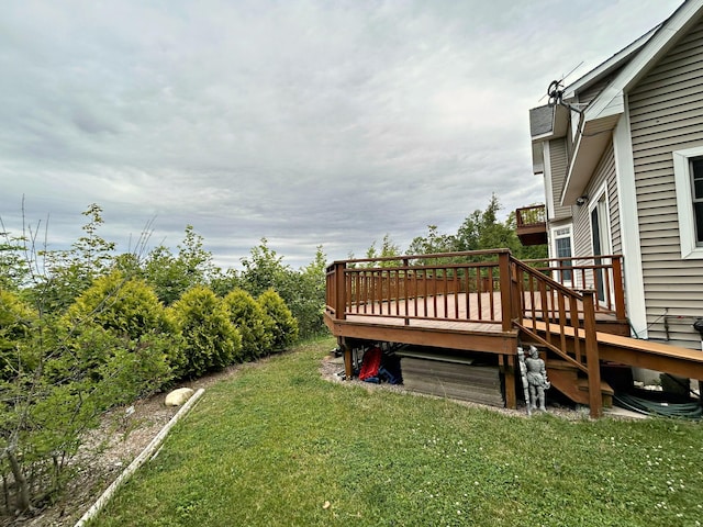 N1746 Smith Rd, Saint Ignace, MI 49781 - view of grassy yard with a wooden deck