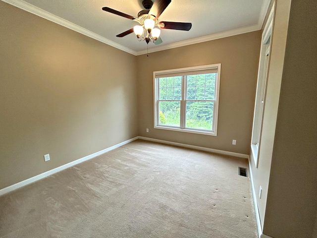N1746 Smith Rd, Saint Ignace, MI 49781 - empty room with carpet floors, crown molding, and a ceiling fan