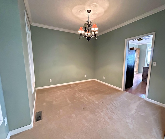 N1746 Smith Rd, Saint Ignace, MI 49781 - unfurnished room featuring ornamental molding, carpet floors, and a chandelier