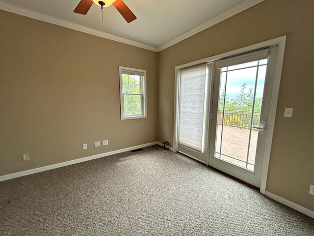 N1746 Smith Rd, Saint Ignace, MI 49781 - empty room with crown molding, ceiling fan, and light colored carpet