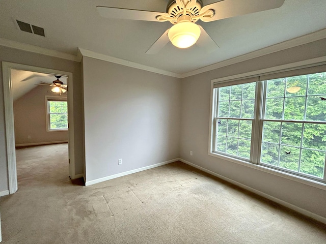 N1746 Smith Rd, Saint Ignace, MI 49781 - empty room featuring light carpet, a ceiling fan, and ornamental molding