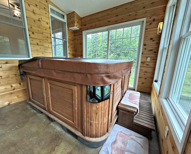 N1746 Smith Rd, Saint Ignace, MI 49781 - detailed view of wooden walls and unfinished concrete floors