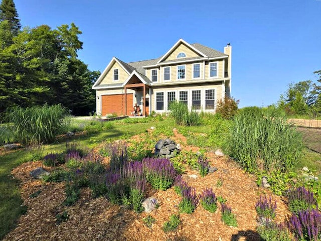 N1746 Smith Rd, Saint Ignace, MI 49781 - craftsman house featuring a chimney