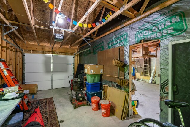 9707 Rogers Rd, Alanson, MI 49706 - garage with a garage door opener