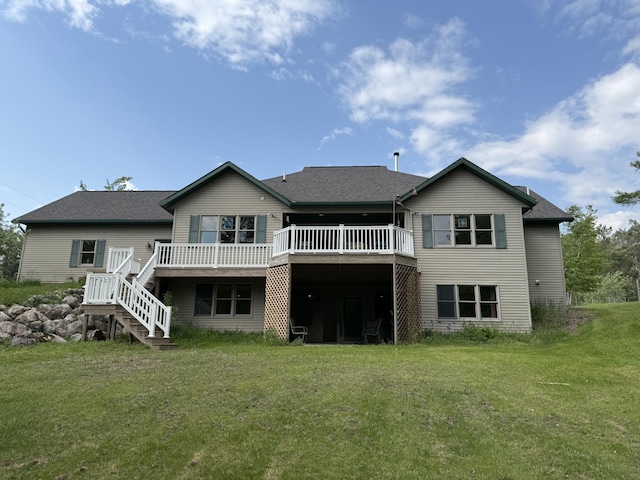 1058 Marlas Way, Cheboygan, MI 49721 - back of house with a wooden deck, a lawn, stairs, and roof with shingles