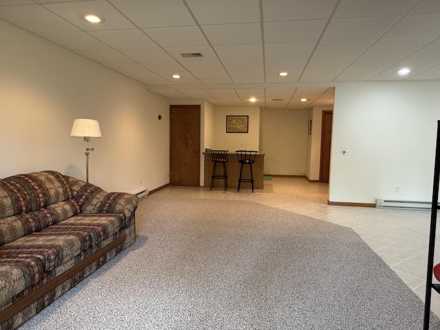 1058 Marlas Way, Cheboygan, MI 49721 - living area with recessed lighting, light carpet, a baseboard radiator, light tile patterned floors, and baseboards