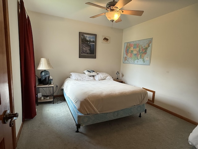 1058 Marlas Way, Cheboygan, MI 49721 - bedroom featuring carpet floors, baseboards, and ceiling fan