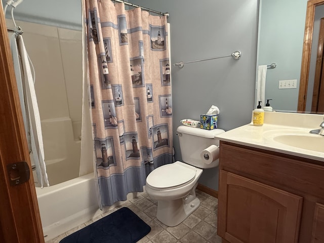 1058 Marlas Way, Cheboygan, MI 49721 - full bathroom with toilet, vanity, shower / bath combo with shower curtain, and baseboards