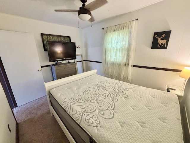 5265 Woodridge Dr, Lewiston, MI 49756 - carpeted bedroom featuring a ceiling fan