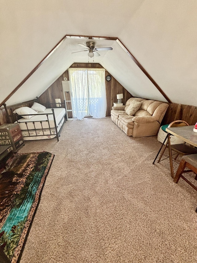 5265 Woodridge Dr, Lewiston, MI 49756 - carpeted living room with lofted ceiling and a ceiling fan