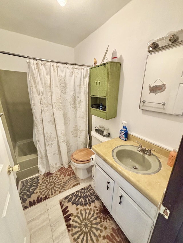 5265 Woodridge Dr, Lewiston, MI 49756 - bathroom featuring vanity, toilet, a shower with curtain, and tile patterned flooring