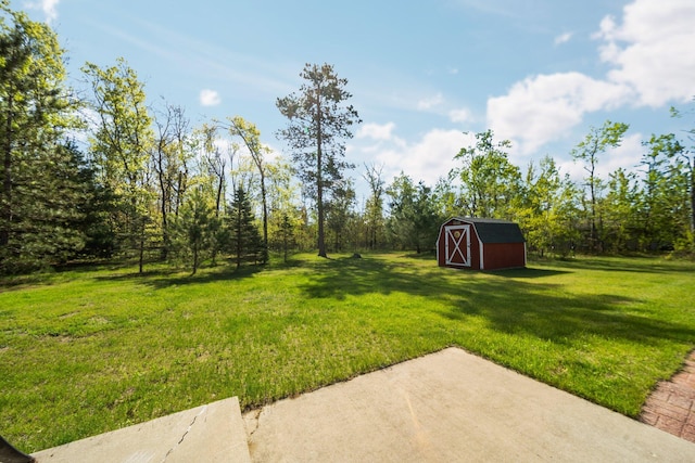 5918 Neumann Rd, Lewiston, MI 49756 - view of green lawn featuring a patio