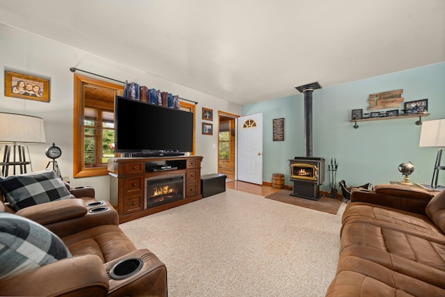 5918 Neumann Rd, Lewiston, MI 49756 - living area with a wood stove