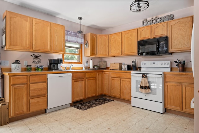 5918 Neumann Rd, Lewiston, MI 49756 - kitchen featuring white appliances, light countertops, hanging light fixtures, a sink, and light floors