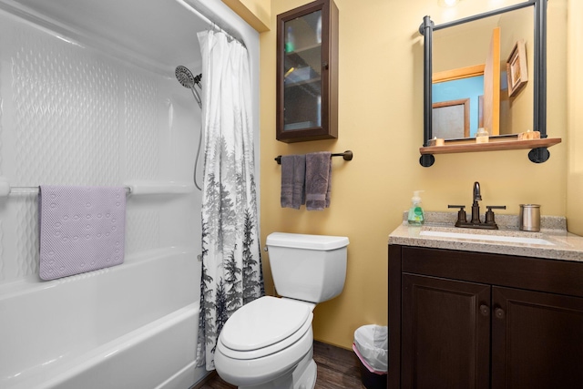 5918 Neumann Rd, Lewiston, MI 49756 - bathroom featuring vanity, toilet, shower / tub combo, and wood finished floors