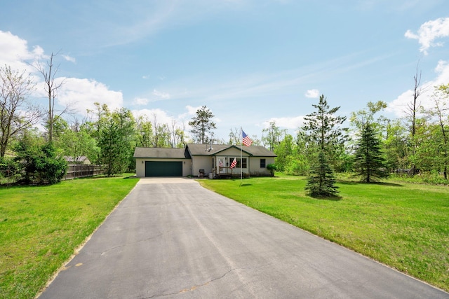 5918 Neumann Rd, Lewiston, MI 49756 - single story home featuring an attached garage and driveway
