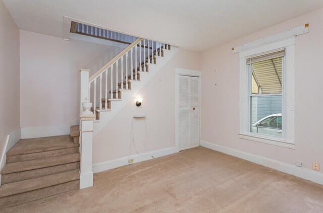 211 S Birney St, Bay City, MI 48708 - staircase with carpet flooring and baseboards