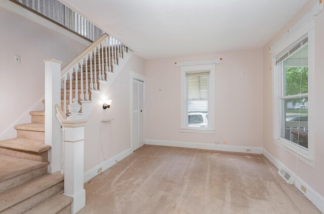 211 S Birney St, Bay City, MI 48708 - stairs with carpet flooring and baseboards