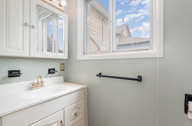 211 S Birney St, Bay City, MI 48708 - bathroom with vanity and plenty of natural light