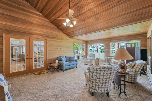 117 Timber Trl, Roscommon, MI 48653 - carpeted living room with wood ceiling, healthy amount of natural light, french doors, wood walls, and ceiling fan