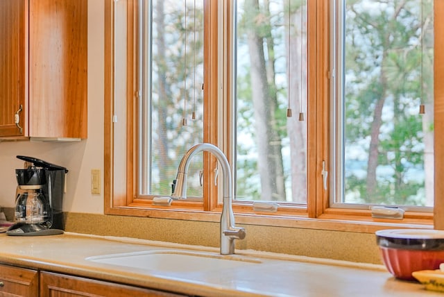 117 Timber Trl, Roscommon, MI 48653 - kitchen view of light countertops and brown cabinetry