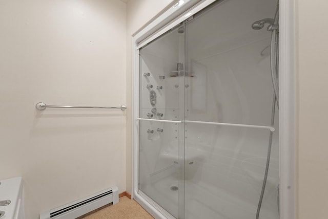 117 Timber Trl, Roscommon, MI 48653 - bathroom with a baseboard radiator and a shower stall