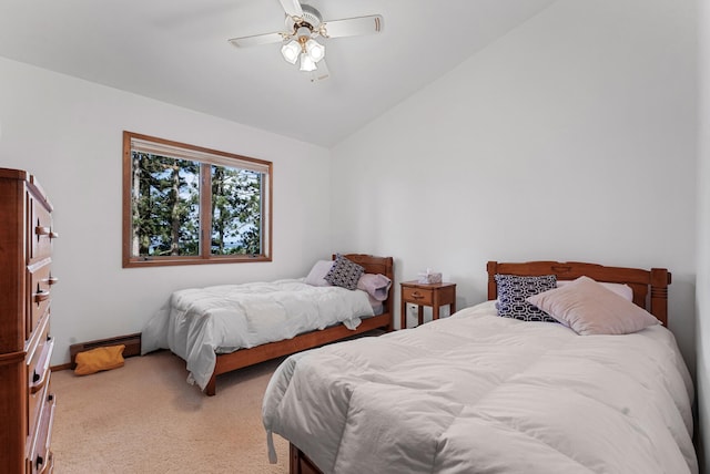 117 Timber Trl, Roscommon, MI 48653 - bedroom with carpet, vaulted ceiling, and a ceiling fan