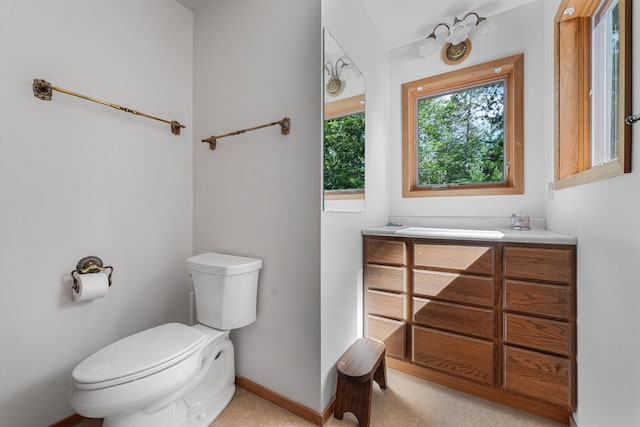 117 Timber Trl, Roscommon, MI 48653 - bathroom with toilet and vanity