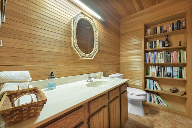 117 Timber Trl, Roscommon, MI 48653 - bathroom with wooden walls, double vanity, brick patterned flooring, and wood ceiling