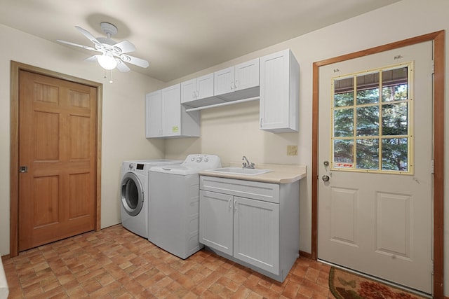 117 Timber Trl, Roscommon, MI 48653 - washroom with washing machine and clothes dryer, cabinet space, a ceiling fan, and brick patterned floors