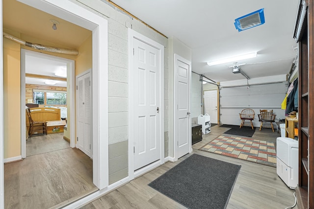 117 Timber Trl, Roscommon, MI 48653 - garage featuring a garage door opener