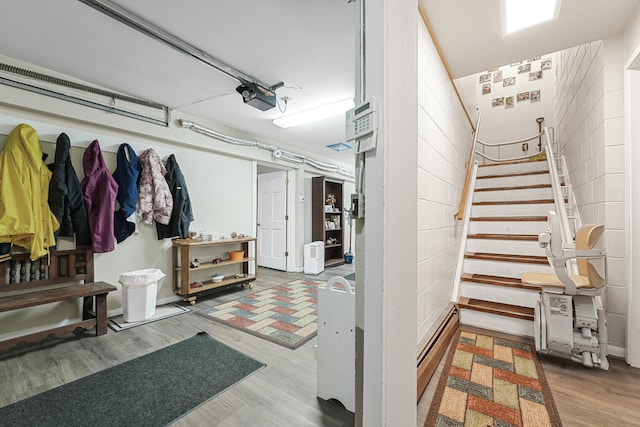 117 Timber Trl, Roscommon, MI 48653 - below grade area featuring wood finished floors and stairway