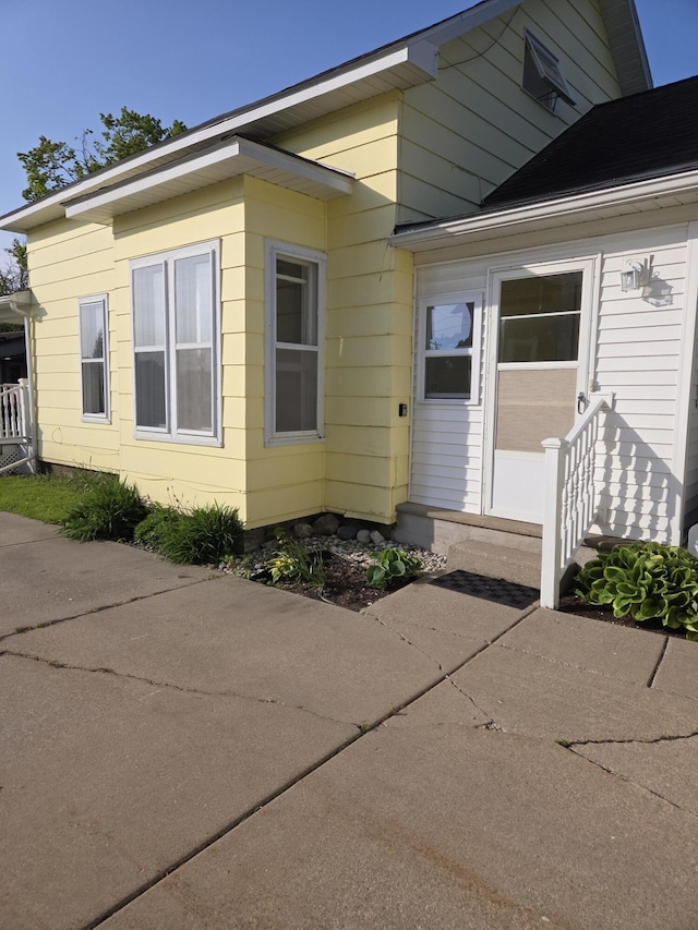 208 S S D St, Cheboygan, MI 49721 - view of side of property with entry steps