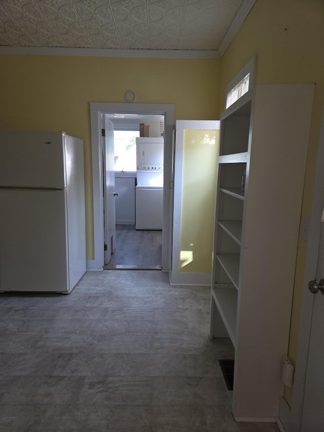 208 S S D St, Cheboygan, MI 49721 - hallway with an ornate ceiling, ornamental molding, carpet flooring, and baseboards